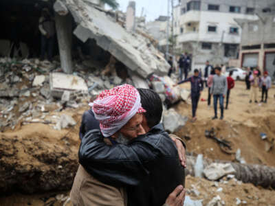 People are assess the damage caused by Israeli bombardment in Deir al-Balah, central Gaza Strip, on February 9, 2024.