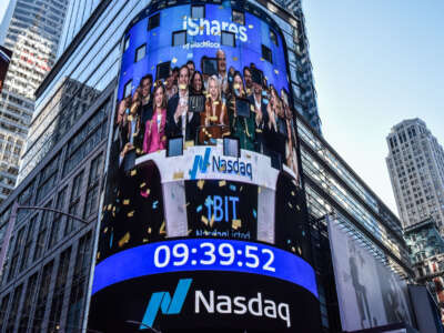 The Nasdaq board in Times Square displays scenes from ringing the opening bell as Bitcoin Spot ETF's are launched on the Nasdaq Exchange on January 11, 2024, in New York City.