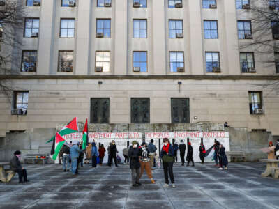 Protesters gather outside the office of Pennsylvania Treasurer Stacy Garrity during the 'Divest From Genocide' rally in Harrisburg, Pennsylvania, on February 5, 2024.
