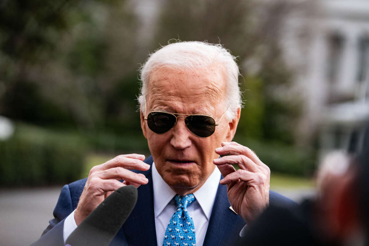 President Joe Biden departs the White House and stops to talk to the press on his way to an event in Miami, Florida, on January 30, 2024.