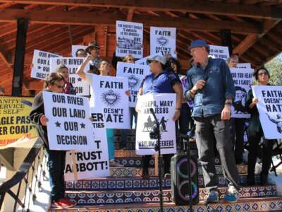 Eagle Pass residents with the newly formed Eagle Pass Border Coalition join with organizers from the No Border Wall Laredo Coalition in San Juan Park just before Texas Gov. Greg Abbott's news conference in Shelby Park on February 4 in Eagle Pass, Texas.