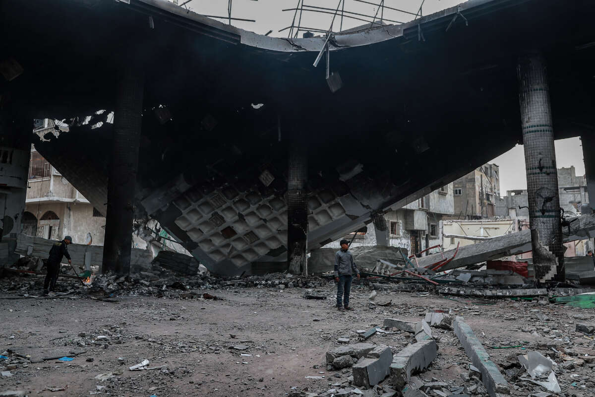 Residents inspect the heavily damaged Al-Huda Mosque as a result of Israeli attacks on Rafah, Gaza, on February 12, 2024.