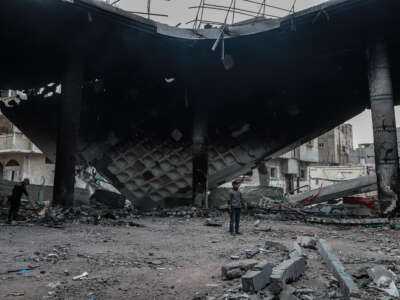 Residents inspect the heavily damaged Al-Huda Mosque as a result of Israeli attacks on Rafah, Gaza, on February 12, 2024.