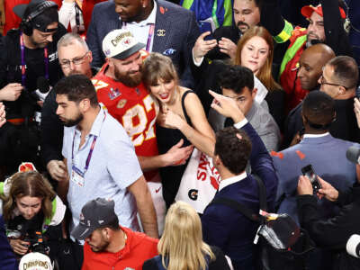 Travis Kelce of the Kansas City Chiefs celebrates with Taylor Swift after his team beat the San Francisco 49ers 25-22 during Super Bowl LVIII at Allegiant Stadium on February 11, 2024, in Las Vegas, Nevada.
