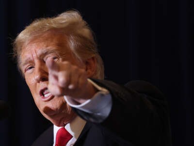 Former President Donald Trump speaks at a campaign event at the Hyatt Hotel on December 13, 2023, in Coralville, Iowa.