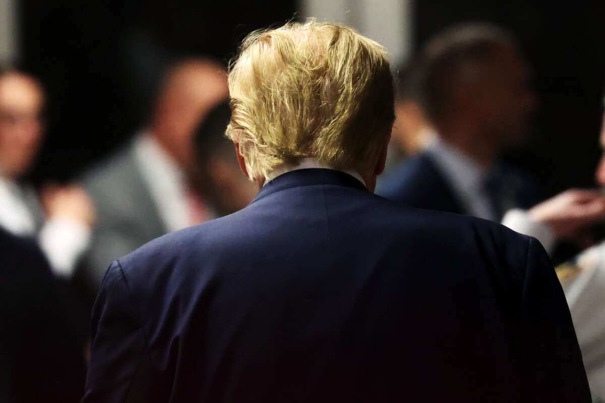 Former President Donald Trump departs a pre-trial hearing in a hush-money case at Manhattan Criminal Court on February 15, 2024, in New York City.