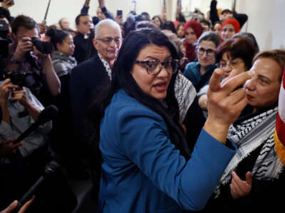 Rep. Rashida Tlaib greets demonstrators with Code Pink for Peace outside her office in the Rayburn House Office Building as they rallied on Capitol Hill in support of Palestinians and to demand a ceasefire in Gaza on February 15, 2024, in Washington, D.C.