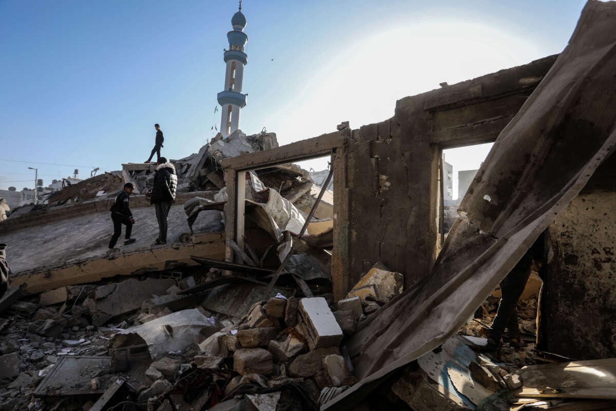 Palestinians inspect the area after Israeli attacks destroyed Al-Farooq Mosque completely and damaged buildings heavily in Al-Shabura neighborhood, Rafah, Gaza, on February 22, 2024.