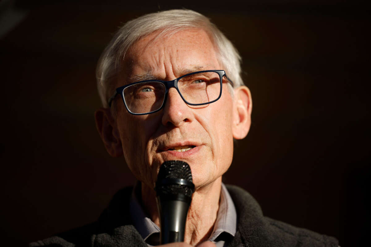 Wisconsin Gov. Tony Evers delivers remarks during a canvassing launch event with volunteers and supporters on November 6, 2022, in Madison, Wisconsin.