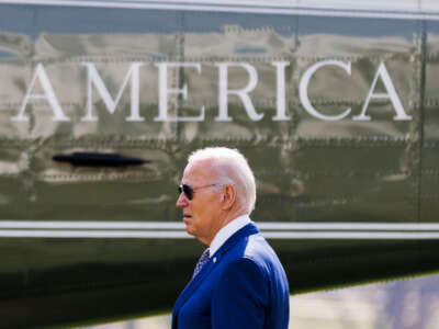 President Joe Biden is walking past Marine One on the South Lawn of the White House in Washington, D.C., on February 26, 2024.