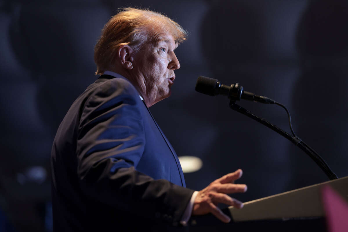 Former President Donald Trump speaks to supporters during an election night watch party at the State Fairgrounds on February 24, 2024, in Columbia, South Carolina.