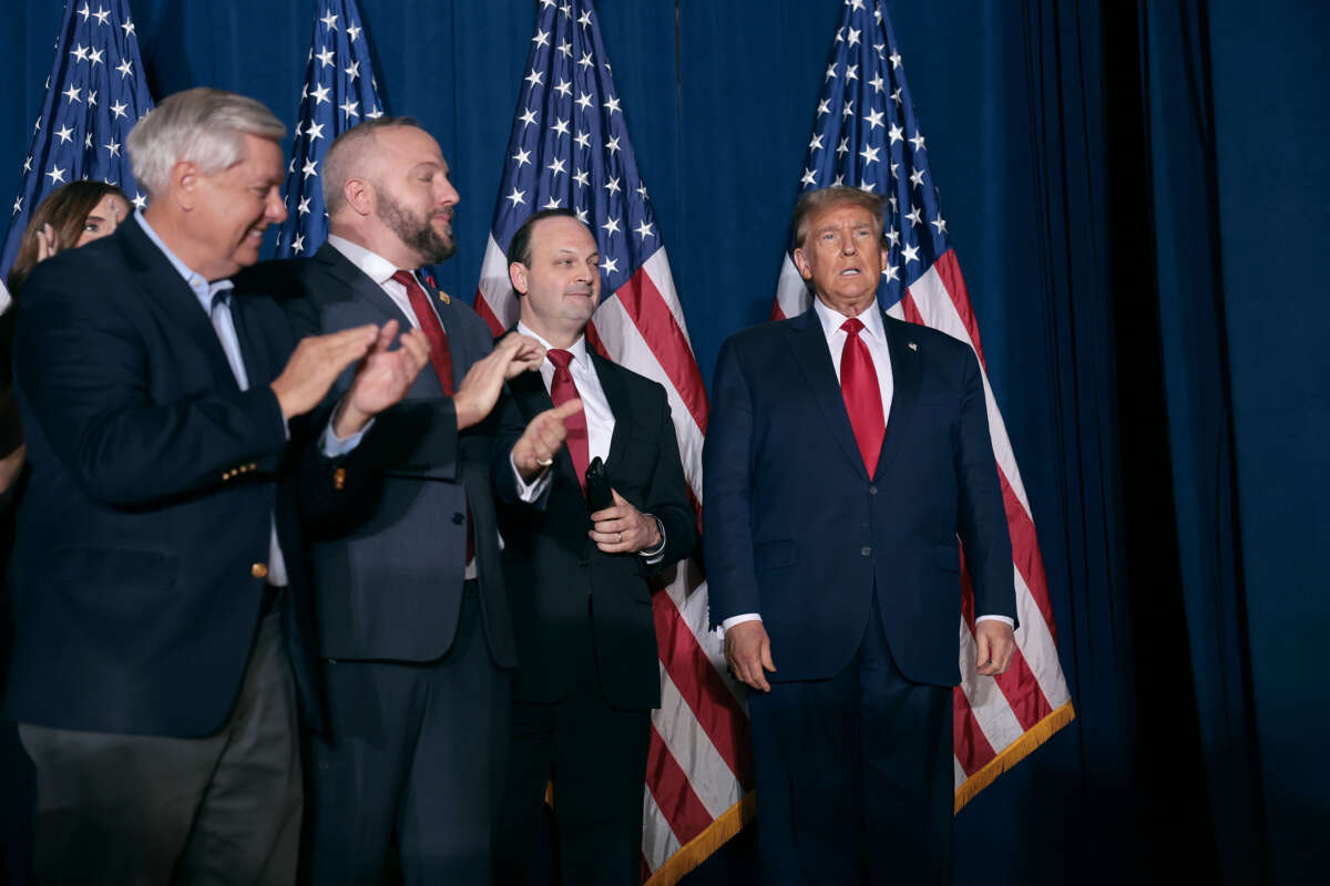 Former President Donald Trump walks on stage to speak during an election night watch party at the State Fairgrounds on February 24, 2024, in Columbia, South Carolina.