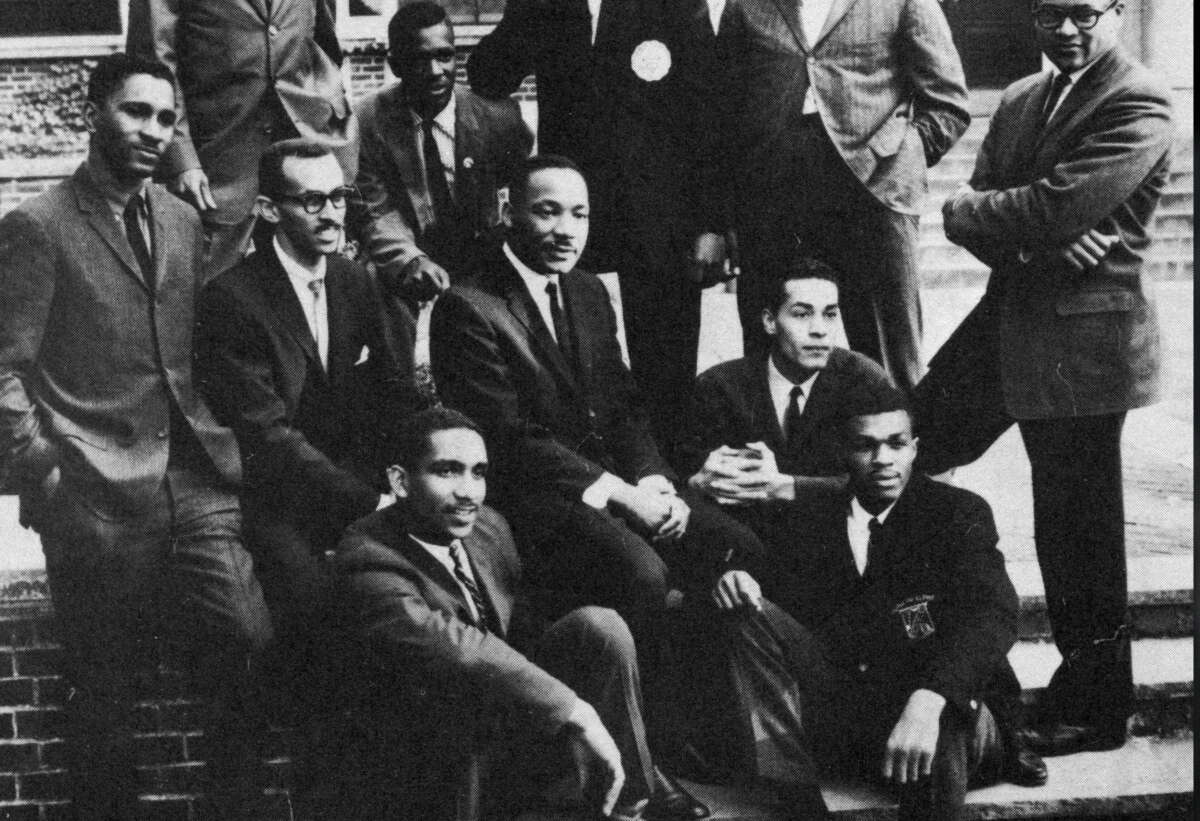Martin Luther King Jr. (center) poses with members of the Student Nonviolent Coordinating Committee.