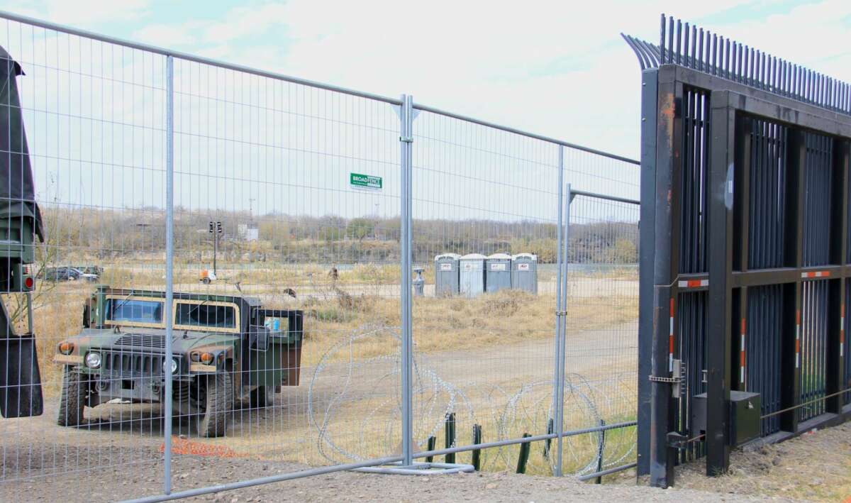 Military vehicles and equipment are staged at the newly gated-off Shelby Park on February 2, 2024, in Eagle Pass, Texas.