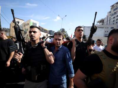 Armed members of the Palestinian resistance during a funeral in the West Bank