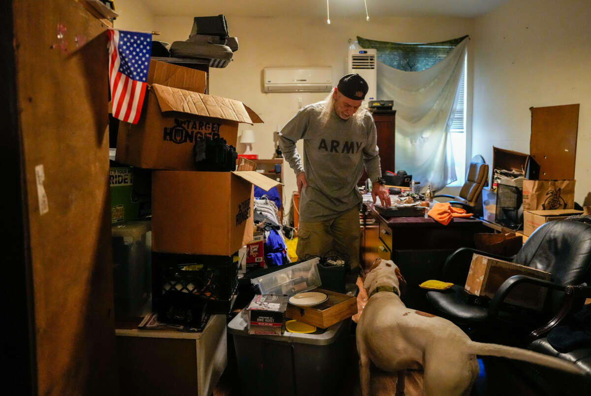 Army Veteran Ronald Payne packs his belongings in preparation for an eviction due to paperwork issues on November 17, 2023, in Houston.