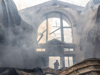 Firefighters of the Ukrainian emergency service extinguish a fire at the Kostiantynivka railway station, after a Russian missile, in Donetsk Oblast, Ukraine, on February 25, 2024.