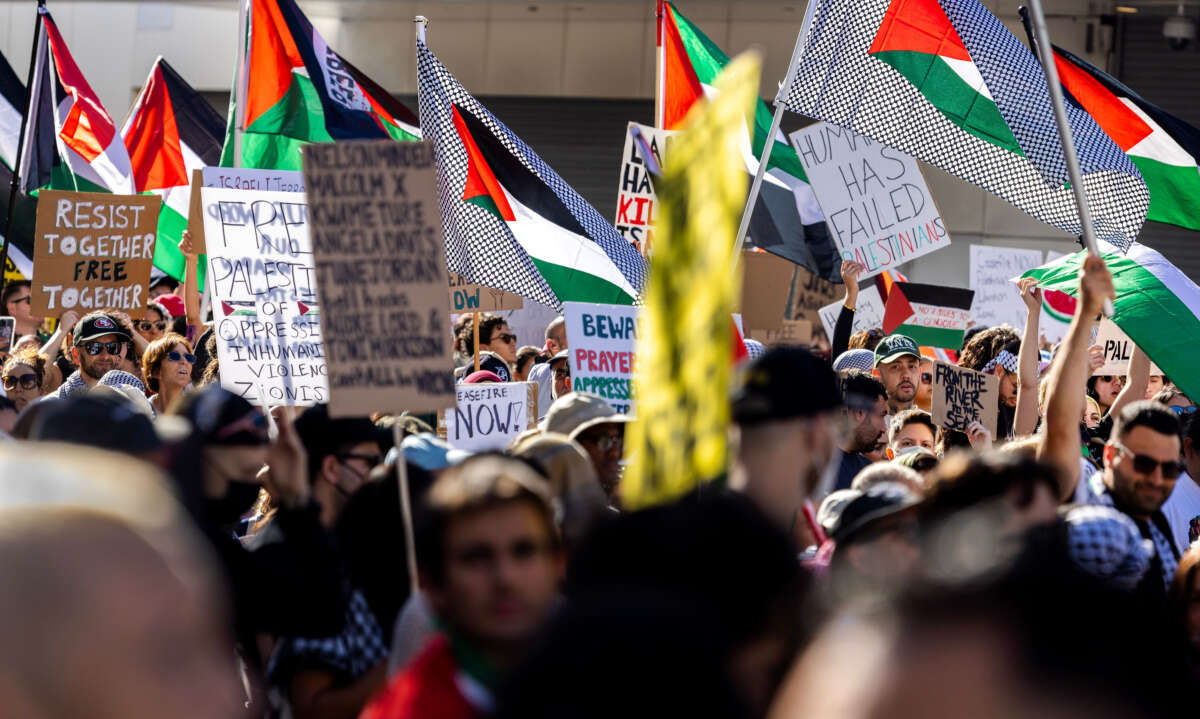 Thousands of demonstrators march through the downtown streets to protest the death toll inflicted on Palestinians during the Israel-Hamas war in Gaza on October 28, 2023, in Los Angeles, California.