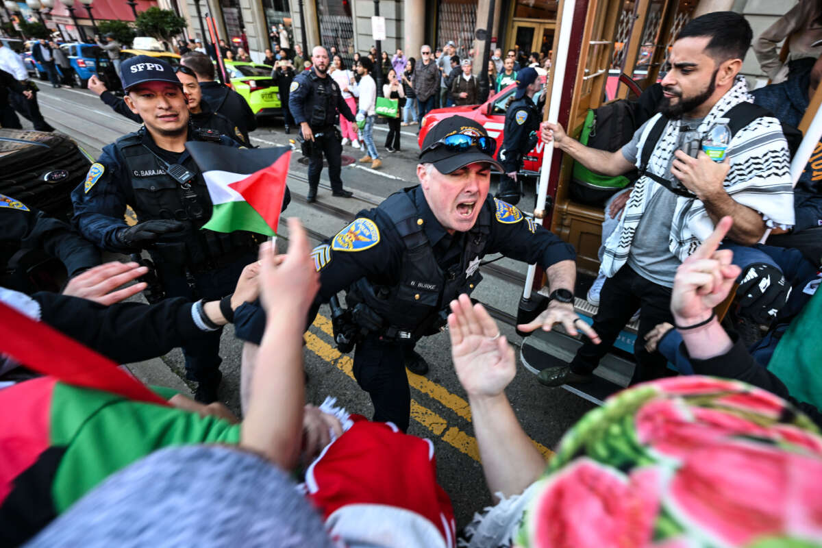 Police make arrests during a pro-Palestine rally at Union Square in San Francisco, California, on December 23, 2023.