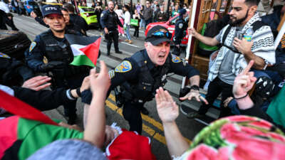 Police make arrests during a pro-Palestine rally at Union Square in San Francisco, California, on December 23, 2023.