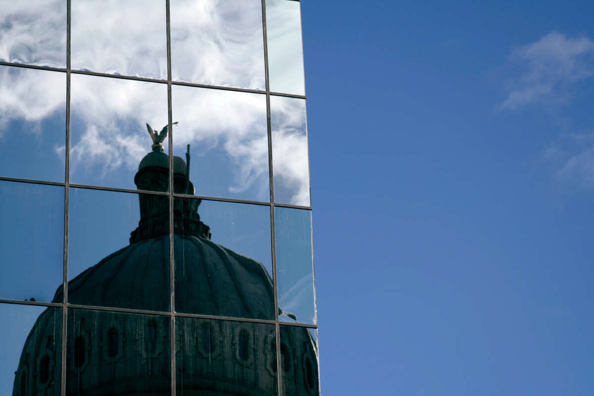 The Idaho State Capitol's dome is seen reflected in Boise, Idaho.
