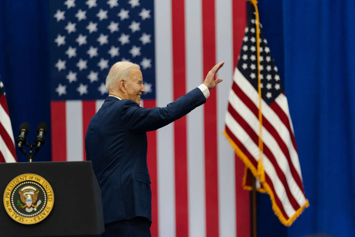 President Joe Biden waves to supporters after speaking at an event about lowering costs for American families at the Granite YMCA Allard Center of Goffstown on March 11, 2024, in Goffstown, New Hampshire.