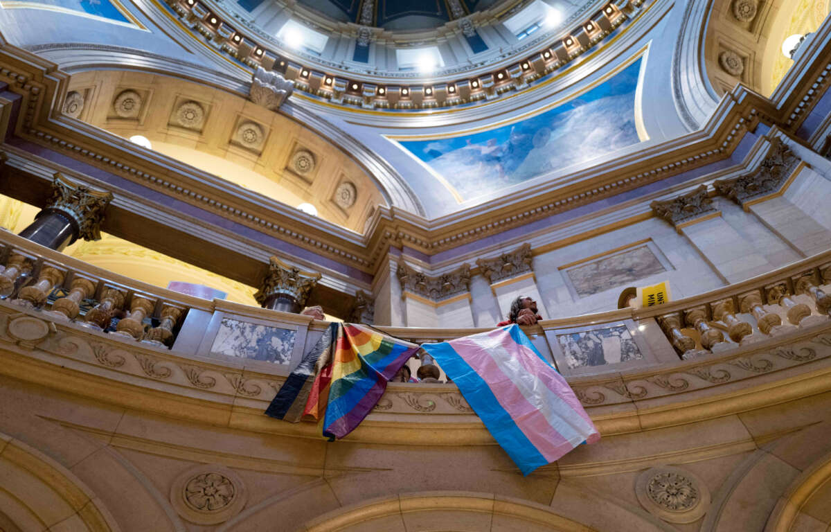 LGBTQ+ activists rally before the Minnesota Senate introduces the Trans Refuge Bill at the State Capitol Building in Saint Paul, Minnesota, on April 21, 2023.