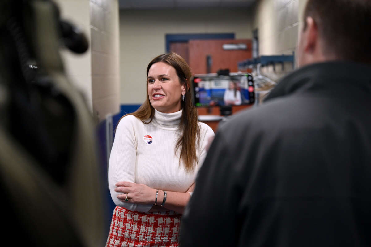 Arkansas Gov. Sarah Huckabee Sanders speaks with reporters after casting her vote on Super Tuesday at Dunbar Recreation Center on March 5, 2024, in Little Rock, Arkansas.