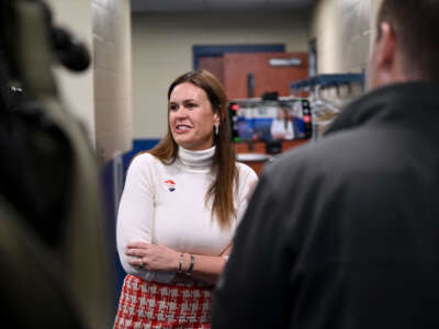 Arkansas Gov. Sarah Huckabee Sanders speaks with reporters after casting her vote on Super Tuesday at Dunbar Recreation Center on March 5, 2024, in Little Rock, Arkansas.