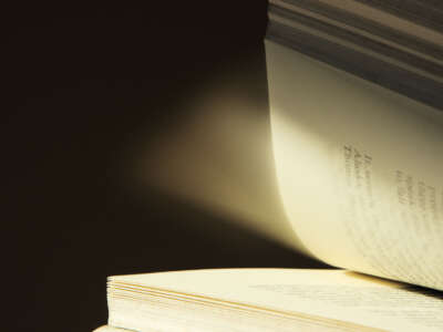Book turning pages in dark