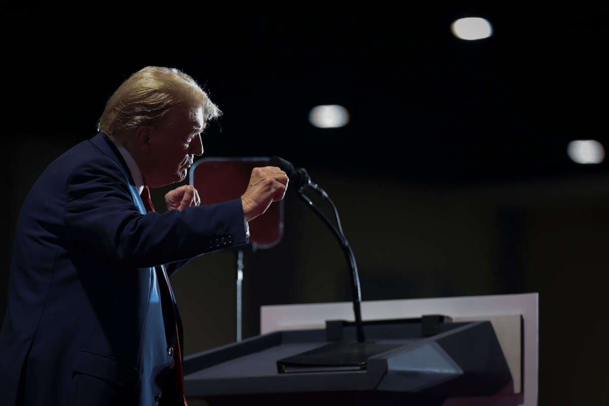 Former President Donald Trump dances on stage after speaking at a Get Out the Vote Rally on March 2, 2024, in Richmond, Virginia.