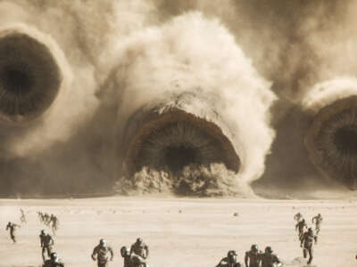 Sandworms charge forward in a scene from Dune: Part 2.