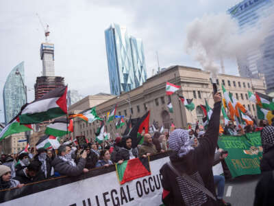 Demonstrators attend a rally in solidarity with Palestinians outside Union Station in Toronto, Ontario, on March 16, 2024.