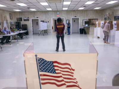 A voter casts their ballot at the Veterans of Foreign Wars Post 3103 polling location on November 8, 2022, in Fredericksburg, Virginia.