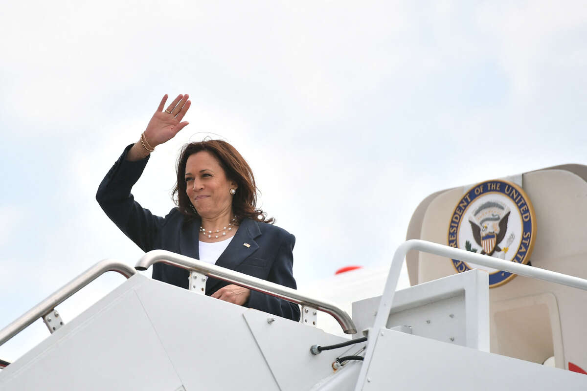 Vice President Kamala Harris makes her way to board a plane before departing from Andrews Air Force Base in Maryland on June 14, 2021.
