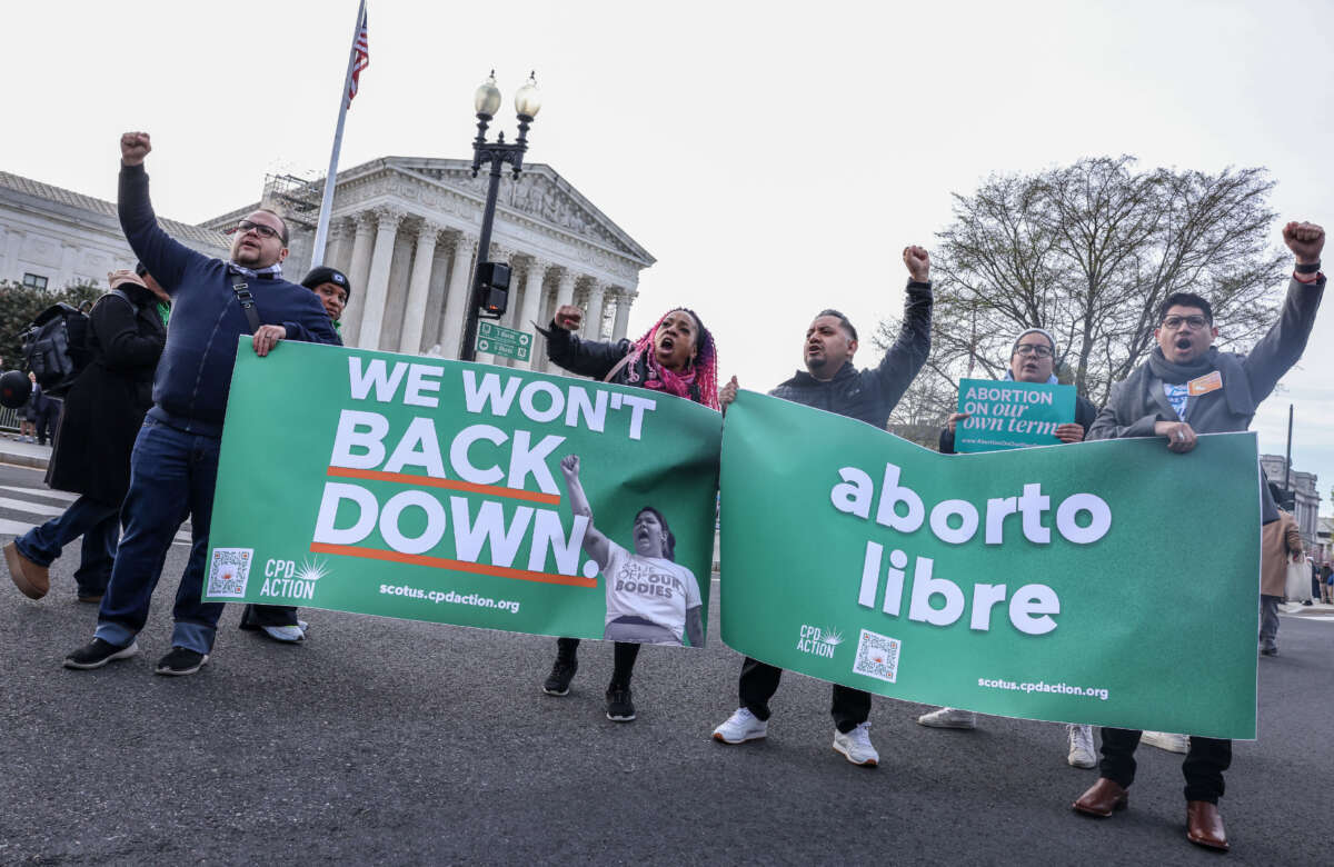 Demonstrators protest in front of the Supreme Court during the Bans Off Our Mifepristone action organized by the Woman's March outside of the Supreme Court on March 26, 2024, in Washington, D.C.