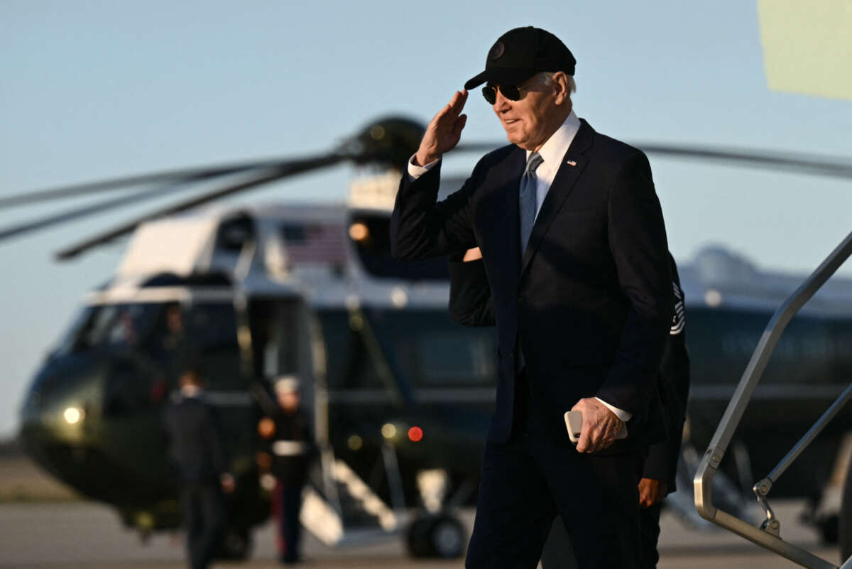 President Joe Biden salutes upon arrival at Joint Base Andrews in Maryland as he returns to the White House on March 21, 2024.