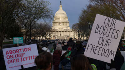 Demonstrators march towards the U.S. Capitol and the Supreme Court during the 'Bans Off Our Mifepristone' action organized by the Woman's March on March 26, 2024, in Washington, D.C.
