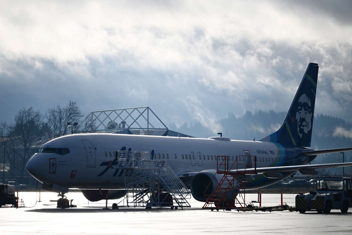 Alaska Airlines N704AL, a Boeing 737 Max 9, which made an emergency landing at Portland International Airport on January 5, is parked at a maintenance hanger in Portland, Oregon, on January 23, 2024.