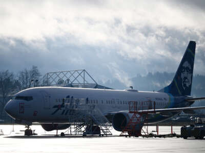 Alaska Airlines N704AL, a Boeing 737 Max 9, which made an emergency landing at Portland International Airport on January 5, is parked at a maintenance hanger in Portland, Oregon, on January 23, 2024.