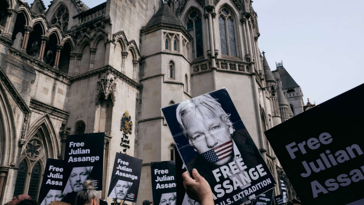 Supporters of Julian Assange gather at the Royal Courts of Justice on March 26, 2024, in London, England.