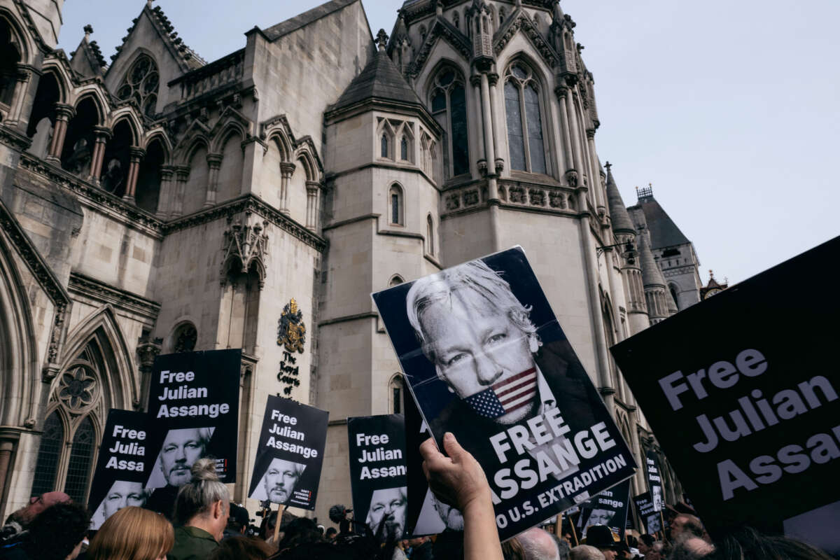 Supporters of Julian Assange gather at the Royal Courts of Justice on March 26, 2024, in London, England.