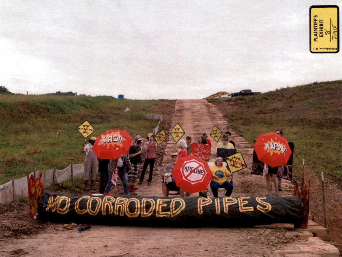 Appalachians Against Pipelines protesters block an access road to a Mountain Valley Pipeline construction site in Virginia in 2023. Mountain Valley Pipeline submitted the photo as an exhibit in a civil suit seeking injunctions against protesters.