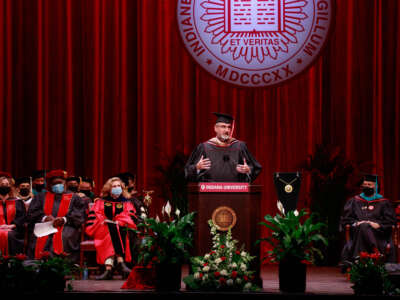 Indiana governor Eric Holcomb speaks during a ceremony at Indiana University in Bloomington.