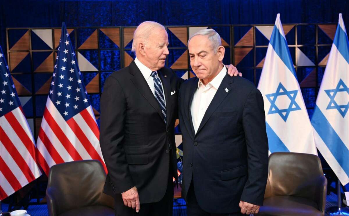 U.S. President Joe Biden (L) and Prime Minister Benjamin Netanyahu (R) meet in Tel Aviv, Israel, on October 18, 2023.