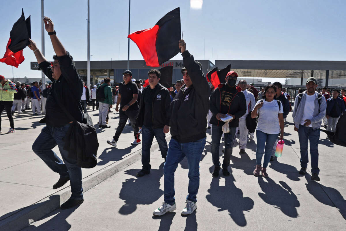 Employees at a plant of the German carmaker Audi protest over wage demands in San José Chiapa, Puebla state, Mexico, on January 24, 2024.