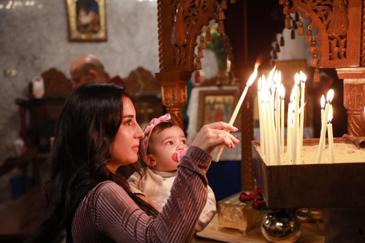 Palestinian Christians celebrate Palm Sunday with a ritual at Church of Saint Porphyrius amid Israeli attacks in Gaza City, Gaza, on March 24, 2024.