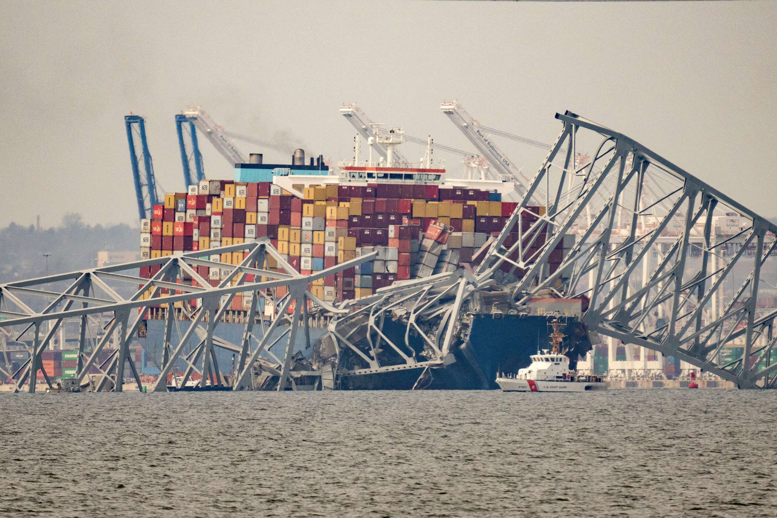 Part of the steel frame of the Francis Scott Key Bridge sits on top of the container ship Dali after the bridge collapsed in Baltimore, Maryland, on March 26, 2024.