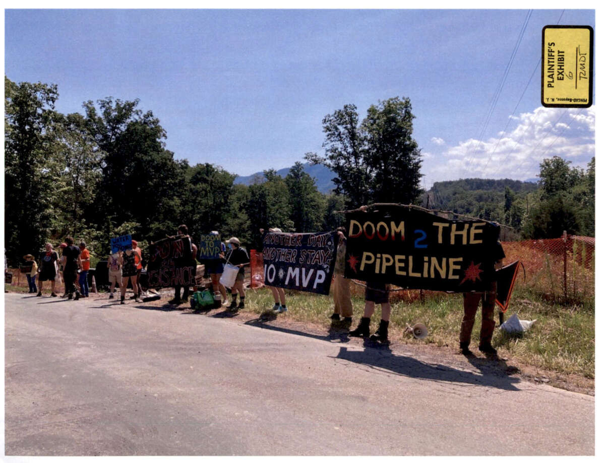 Appalachians Against Pipelines protesters rally on a roadside near a Mountain Valley Pipeline construction site in Virginia in 2023. Mountain Valley Pipeline submitted the photo as an exhibit in a civil suit seeking injunctions against protesters.