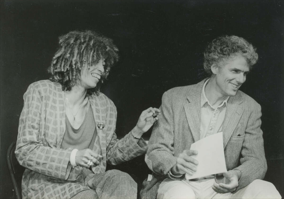 Bingham with Angela Davis at a post-trial event, 1980s.